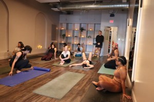 Corporate wellness yoga class at an Atlanta office with FitConcierge